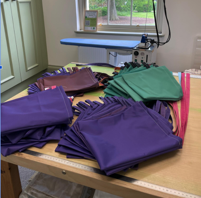 Carried with care: 560 drain bag carriers for cancer patients, made from exhibition leftovers